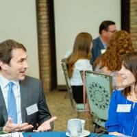 Two guests talking with each other at Scholarship Dinner 2019